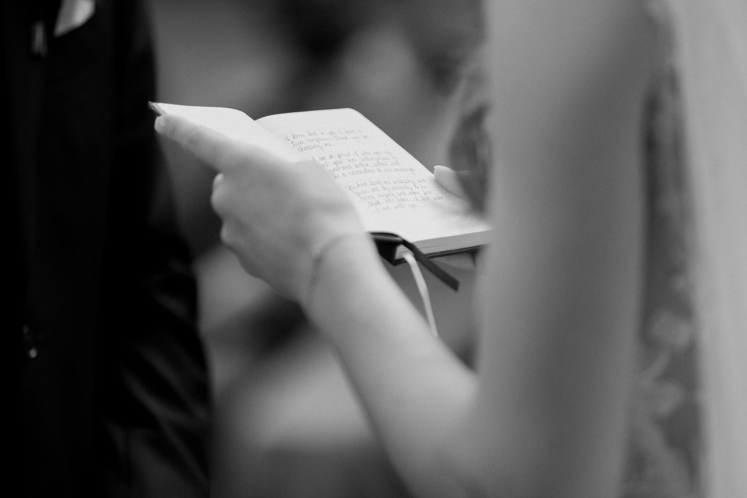 Soft focus black and white detail shots from a wedding ceremony.