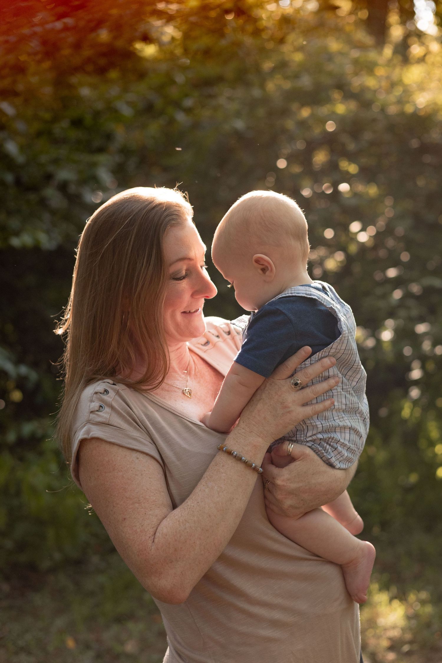 A mom holds her baby close.