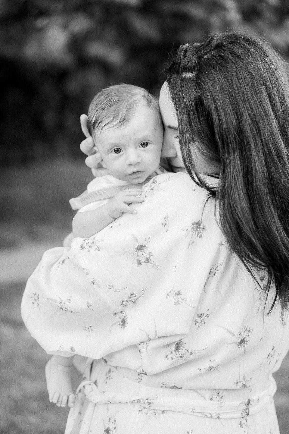 Mother hugging her child during a family lifestyle photoshoot