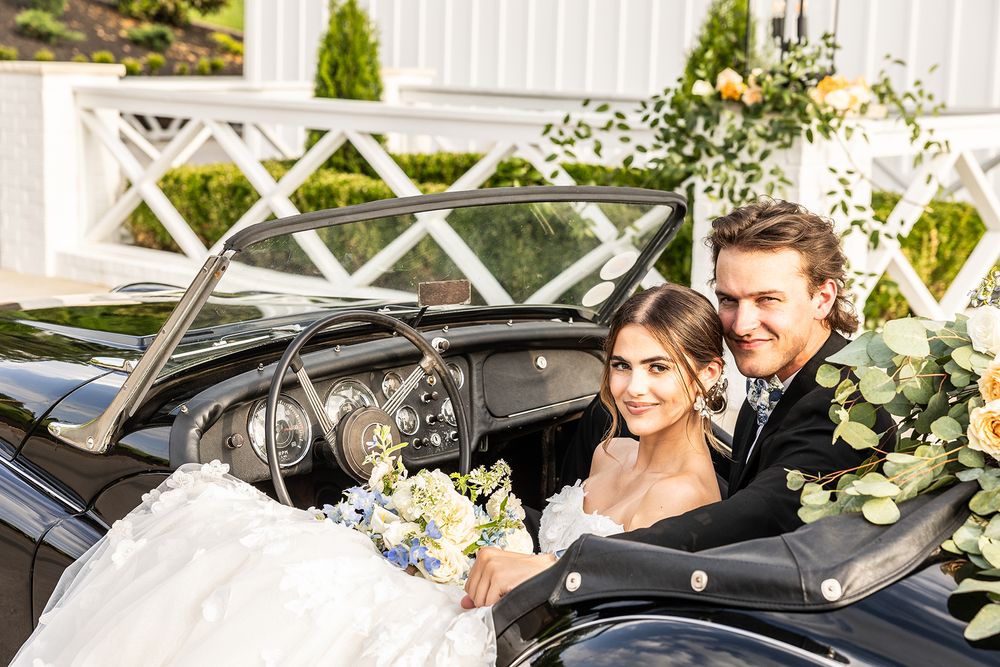 bride and groom in car, antique car, luxury wedding, wedding gown, wedding venue, nc wedding photographer, sc photographer, luxury venue, tn