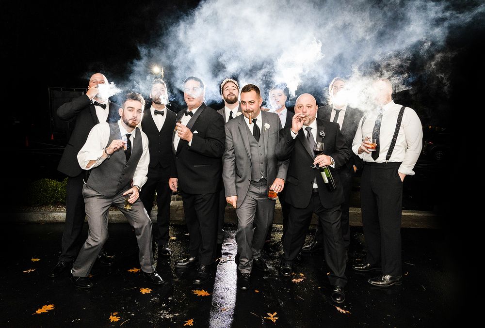 best wedding photos, groom, groomsmen, wedding photographer, night photos, cigar photos, cigar, wedding inspiration, North Carolina wedding