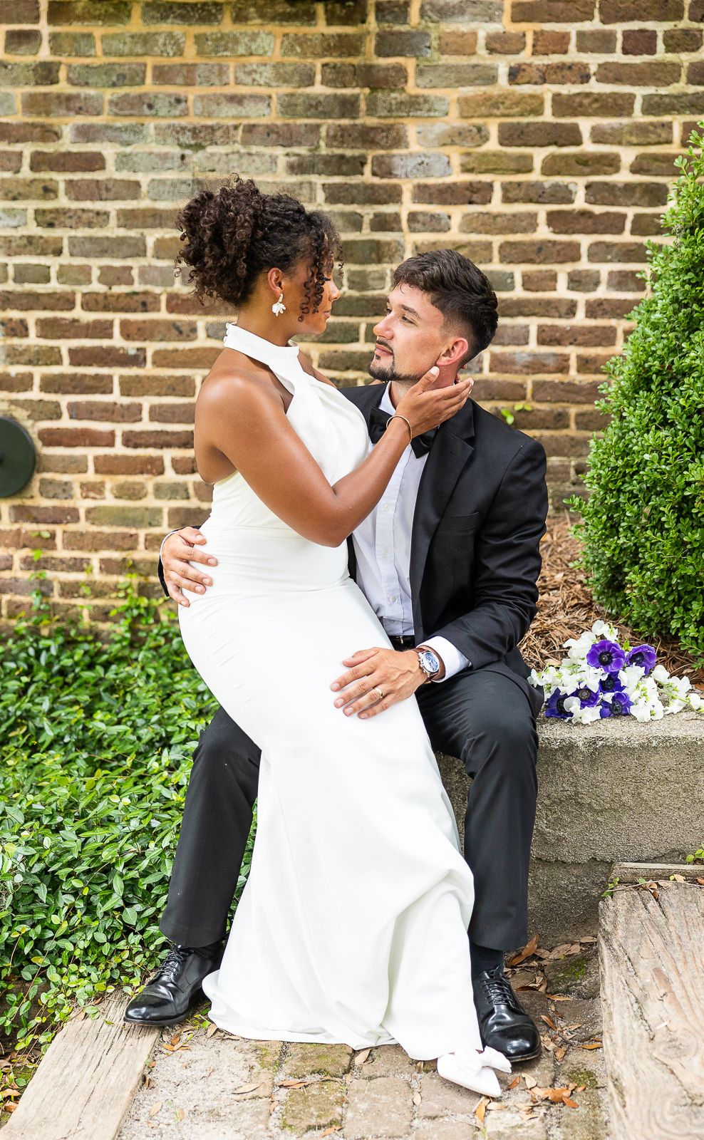 bride and groom, mixed race couple, wedding photographer, bridal bouquet, black bride, hispanic groom, wedding decor, wedding gown, bricks