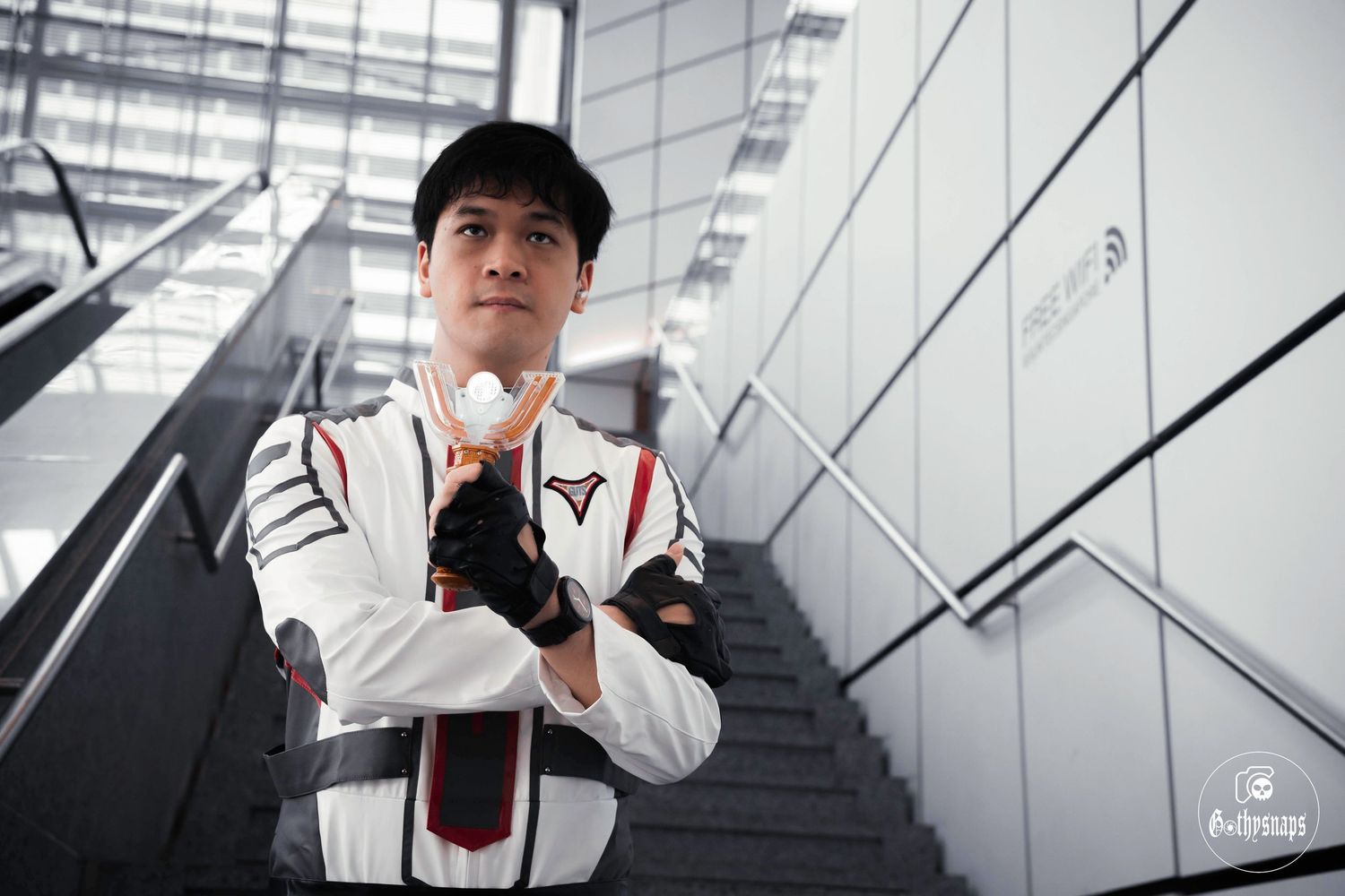 An ultraman cosplayer showcasing his power within his character.