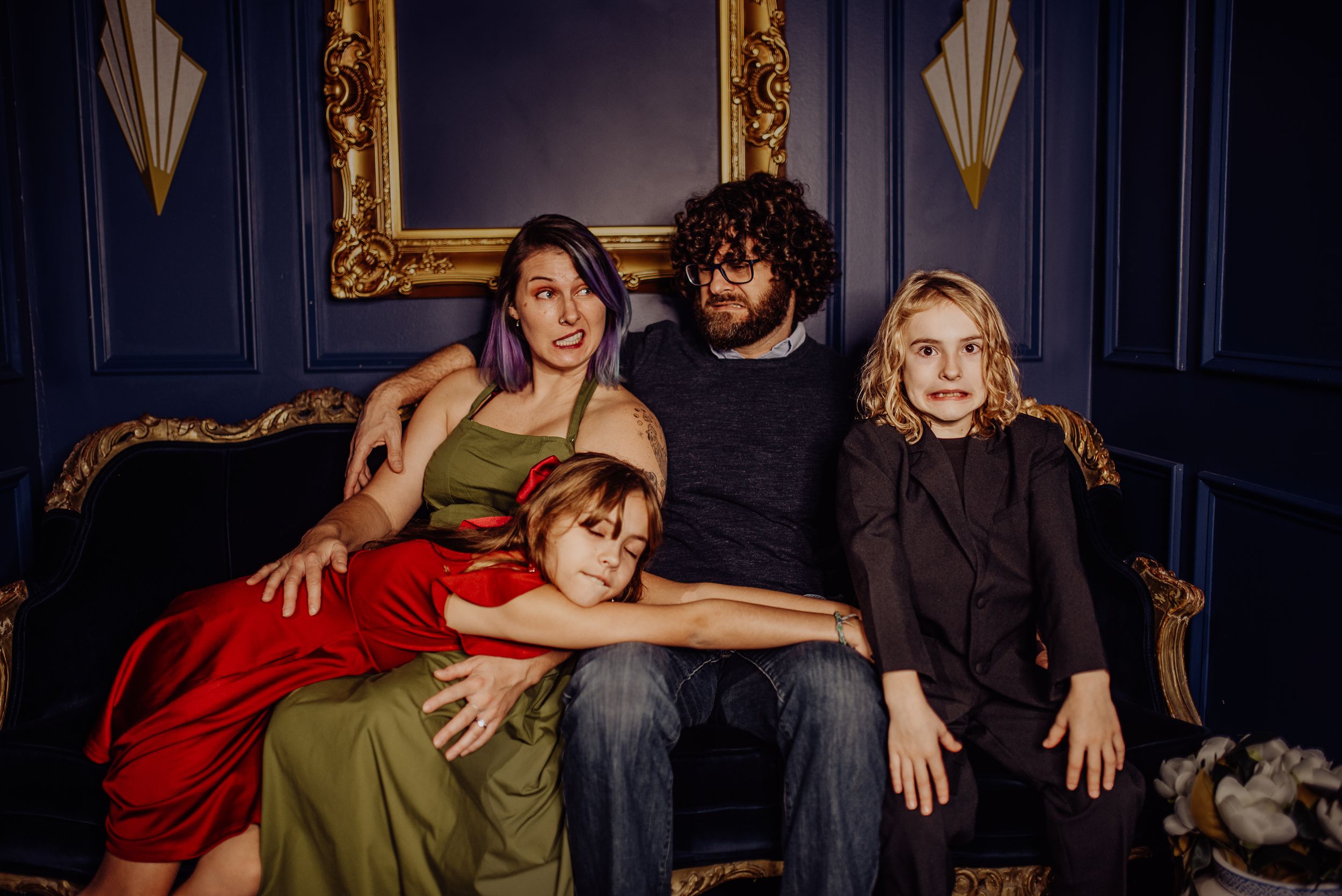 A series of dramatic theater-style portraits showing performers in ornate blue and gold settings.