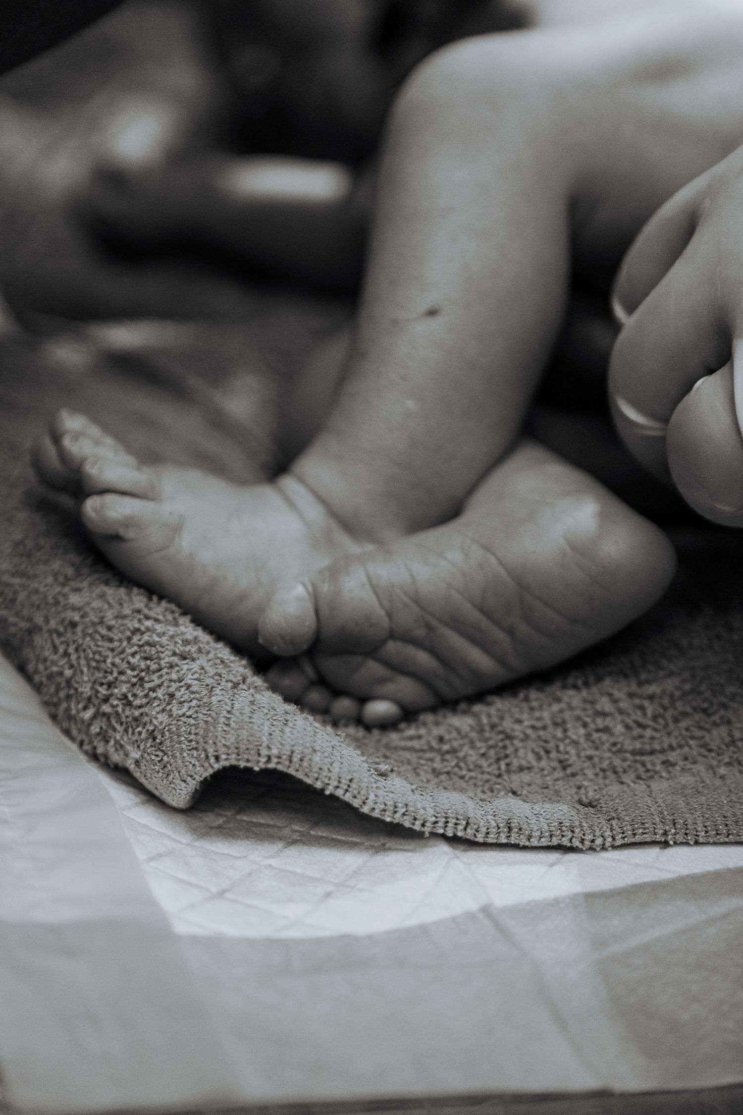 Emotional birth photography in Johannesburg showing skin-to-skin contact, newborn bonding, and the power of childbirth.