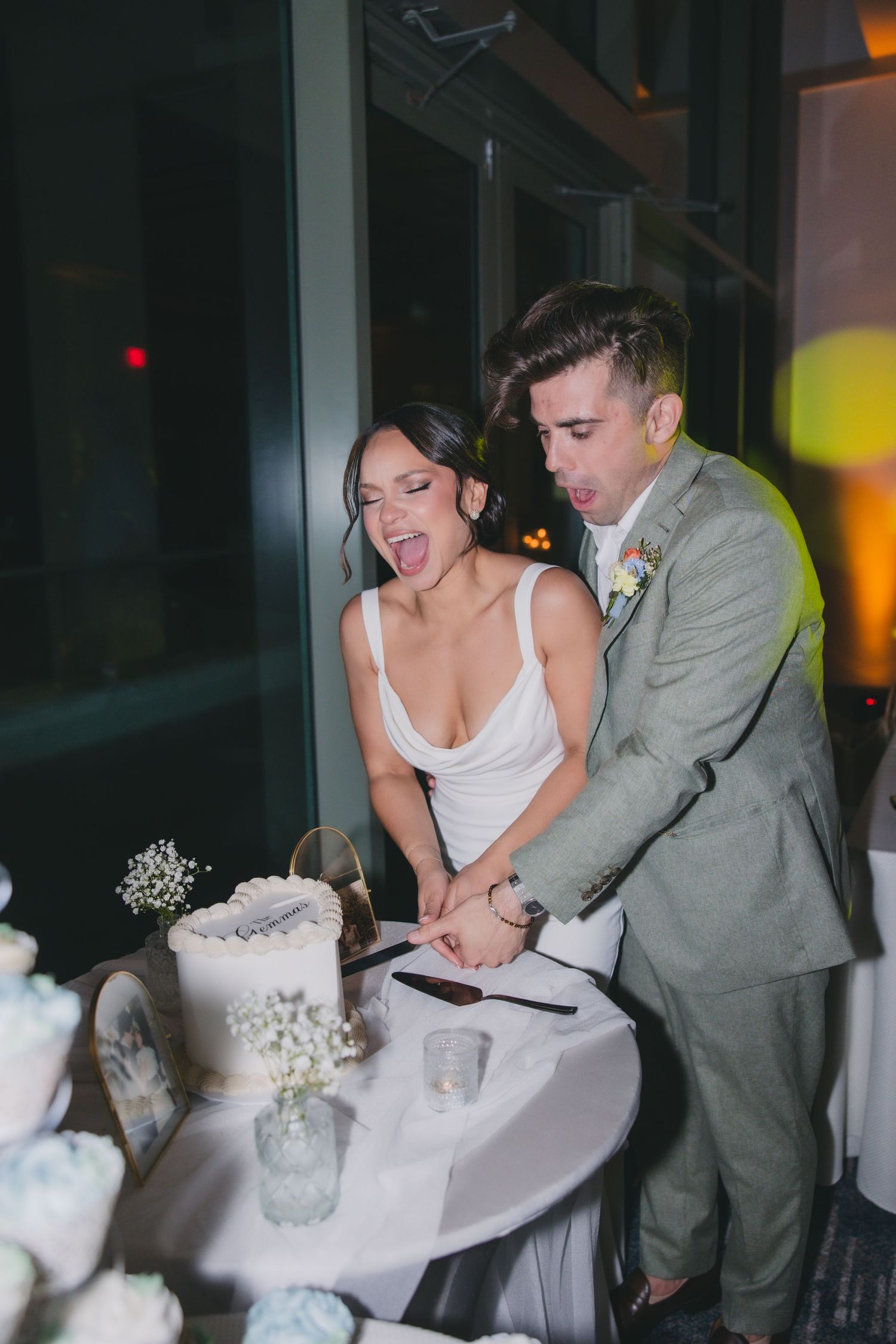Christina and Max — cake cutting moment at their Puerto Rico wedding reception | POST-TALES WEDDS destination wedding.