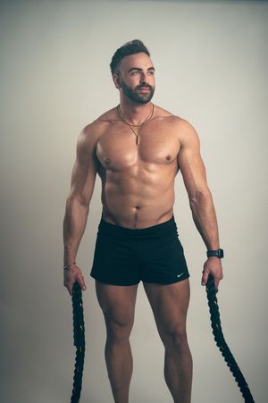 Salt Lake City Male Utah Fitness and gym photography poses. Moody, professional photos that show movement, life, and authenticity. Male form