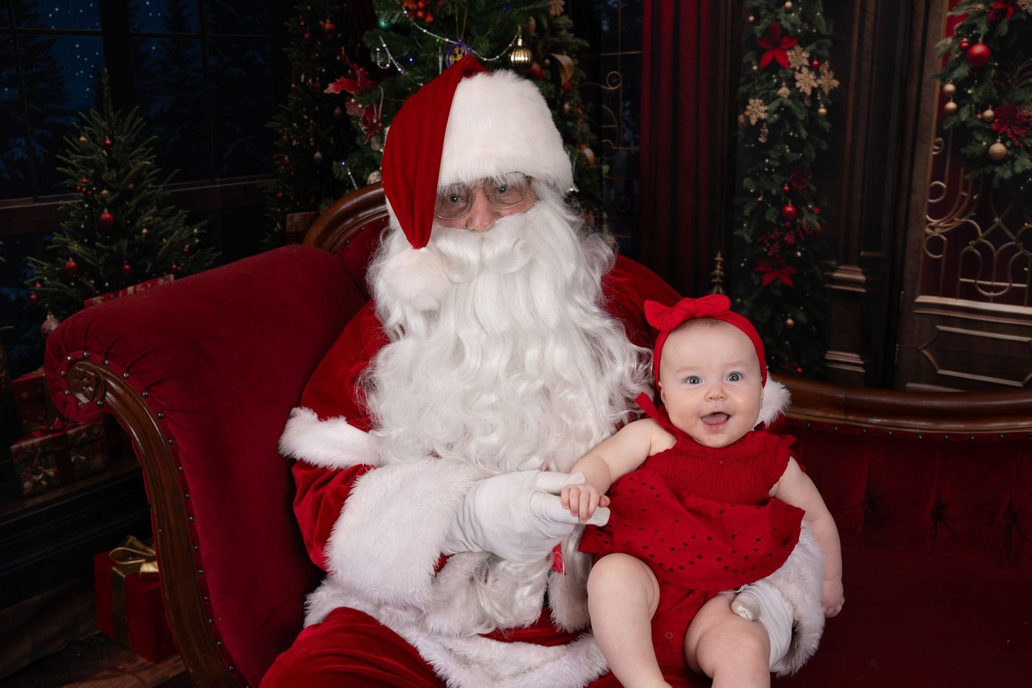 A series of holiday photos showing a baby in red outfit sitting with Santa Claus in a traditional Christmas portrait setting.