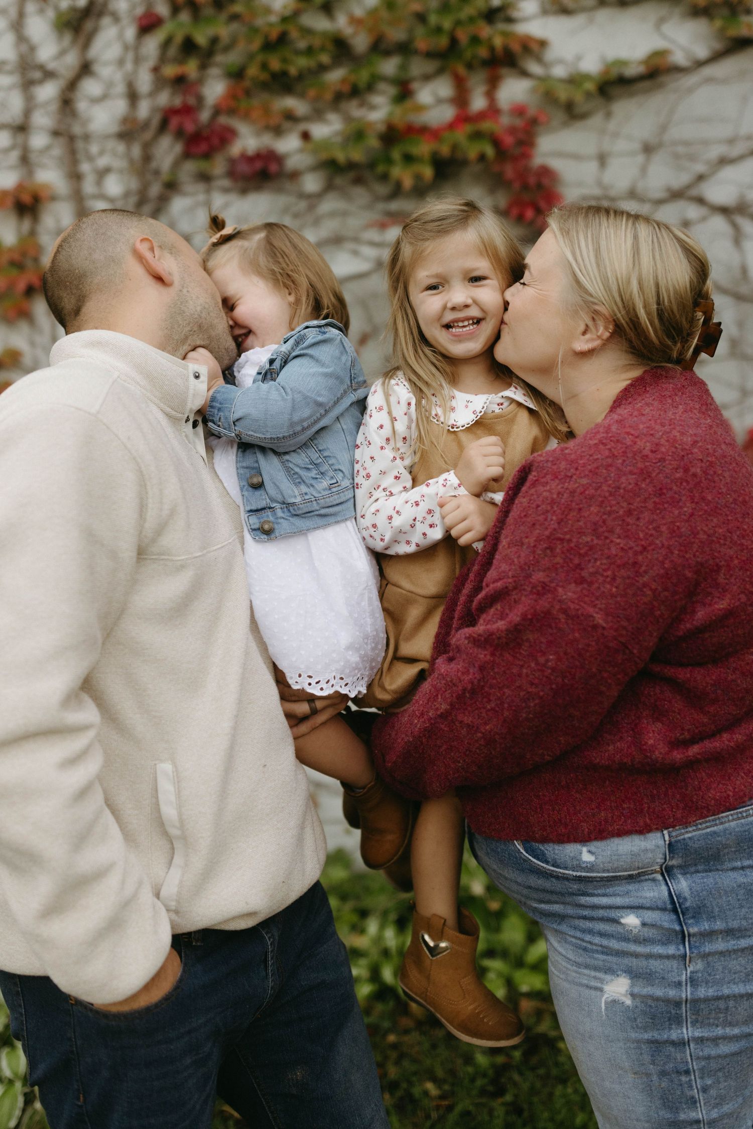 A series of candid romantic moments between a couple wearing casual clothing against a leafy background.
