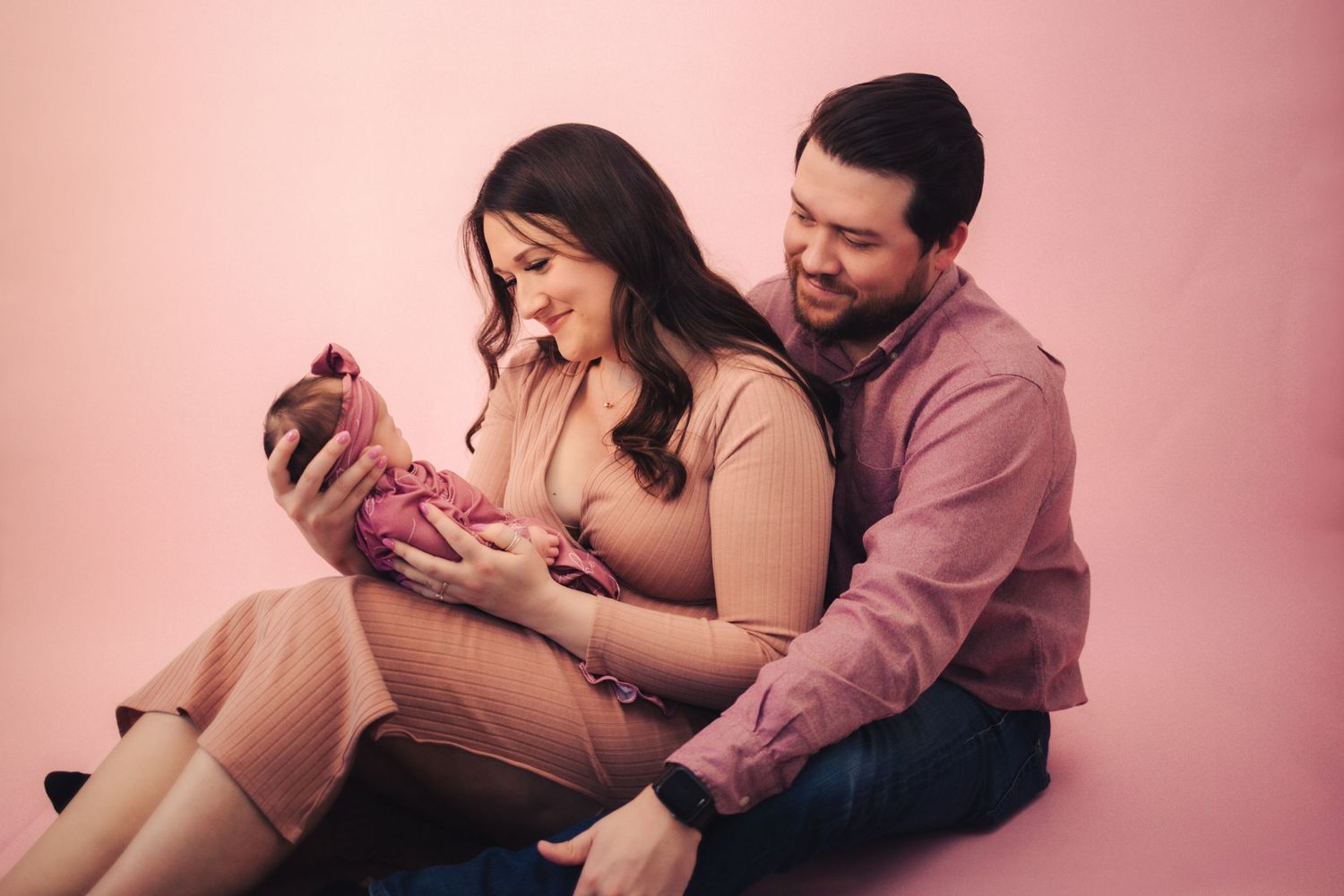 Intimate motherhood moment under weeping willow in Nichols Hills