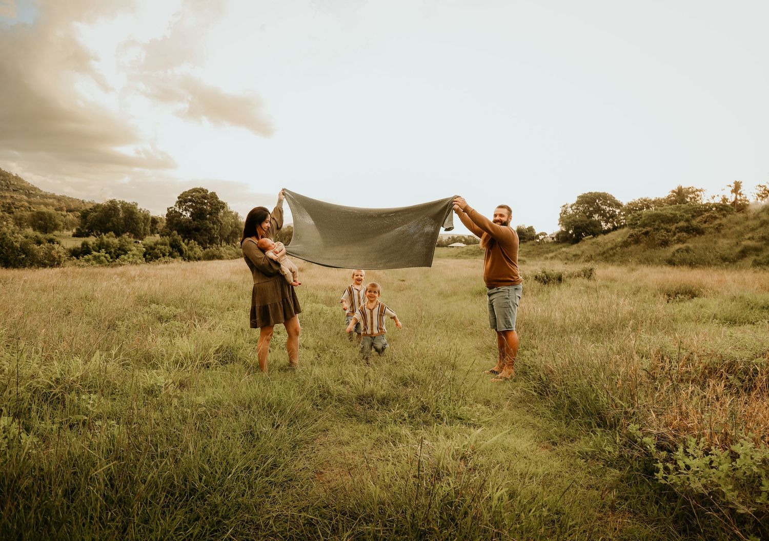 Playing outside with mum and dad