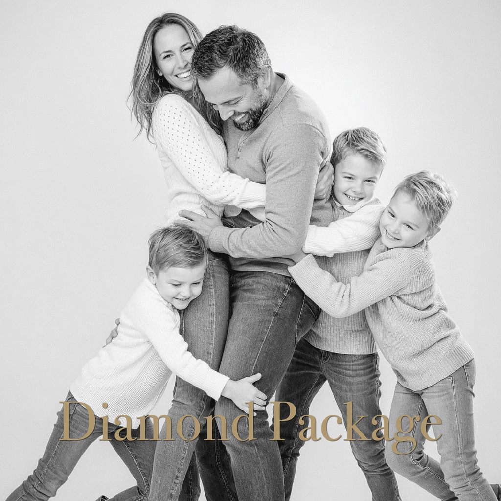 Diamond Package - Black and white portrait of a happy family embracing and laughing together in a casual studio setting.
