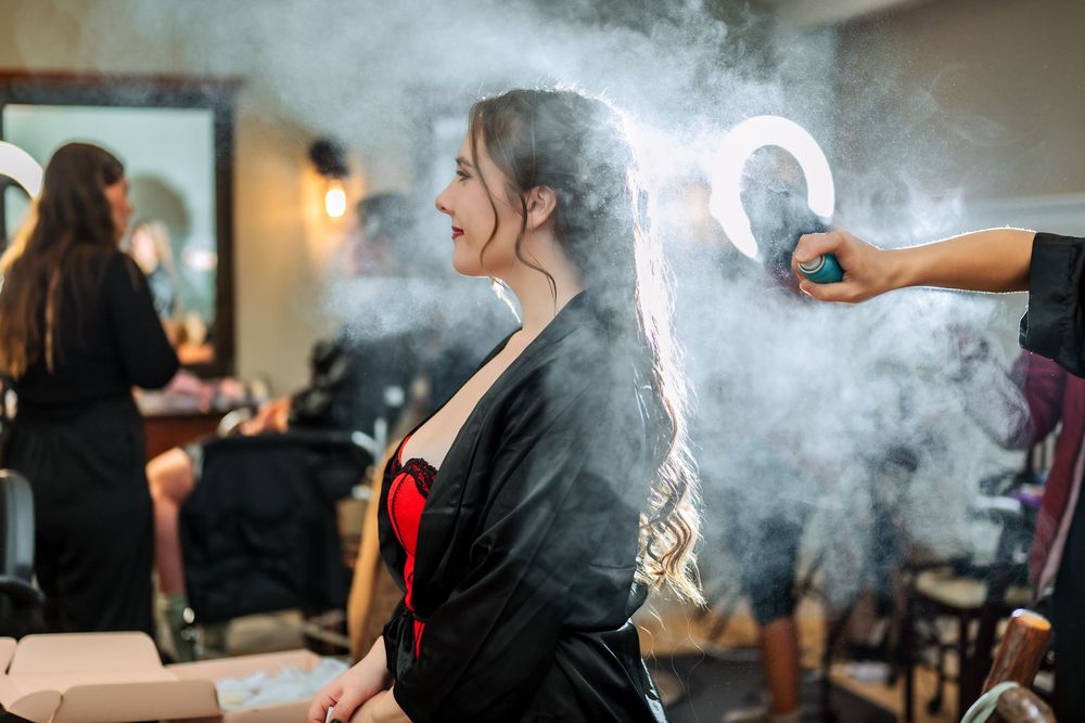Atmospheric shot with smoke and lighting effects during preparation event.