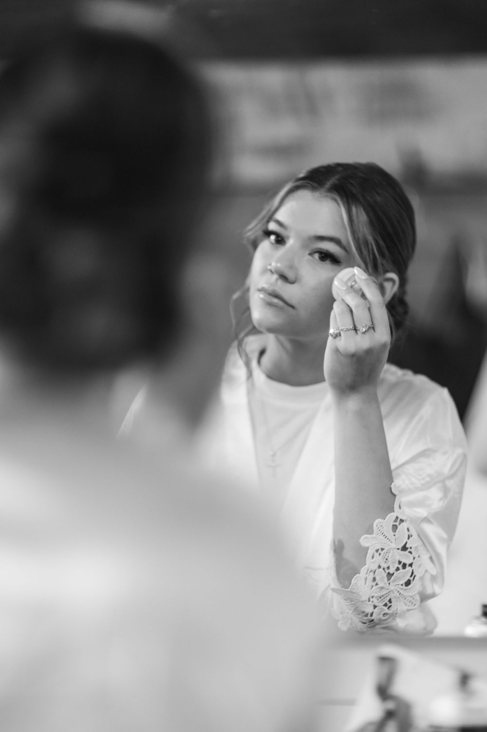 A black and white photo sequence shows someone in a white shirt looking upward in contemplative poses.