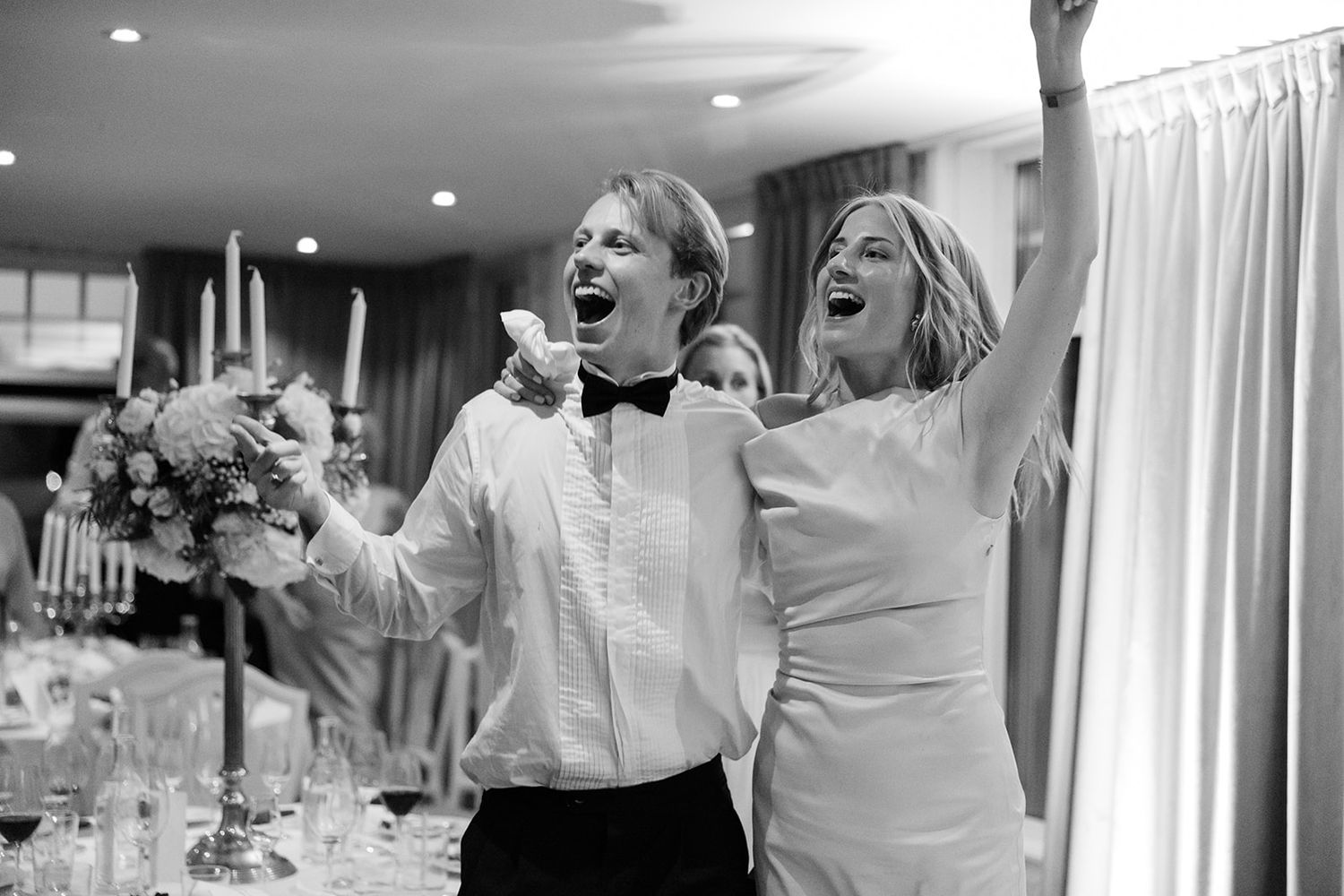 A joyful wedding celebration montage showing candid moments of laughter and dancing at an elegant indoor reception.