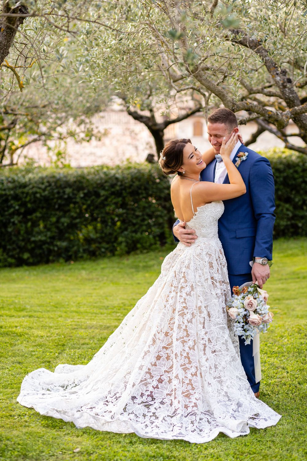 Romantic sunset portraits at Nun Assisi Relais with Umbrian hills in the background.