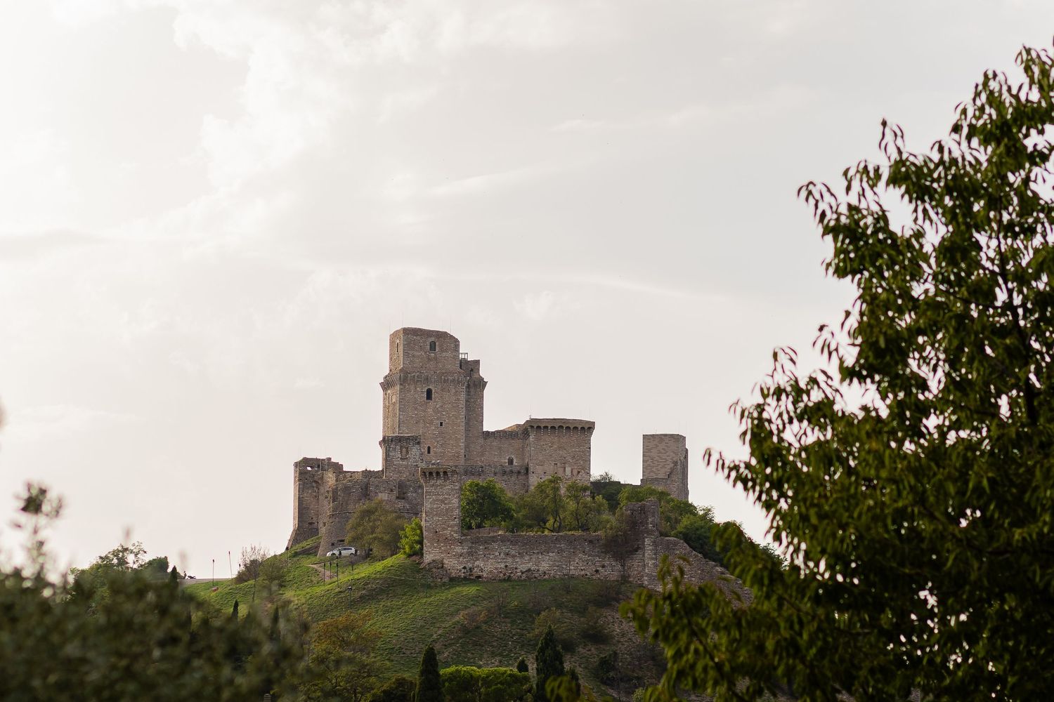 The Basilica of Assisi rising above the hills — a breathtaking Italian backdrop for destination weddings in Umbria
