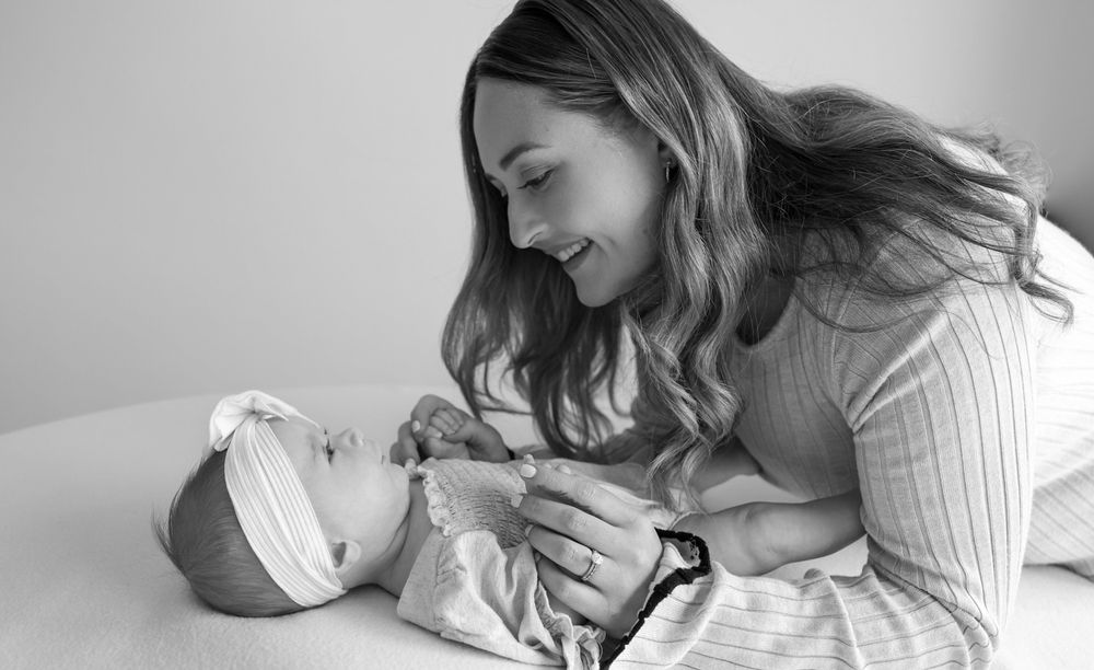 Mother and daughter during mini session, capturing the love and connection.