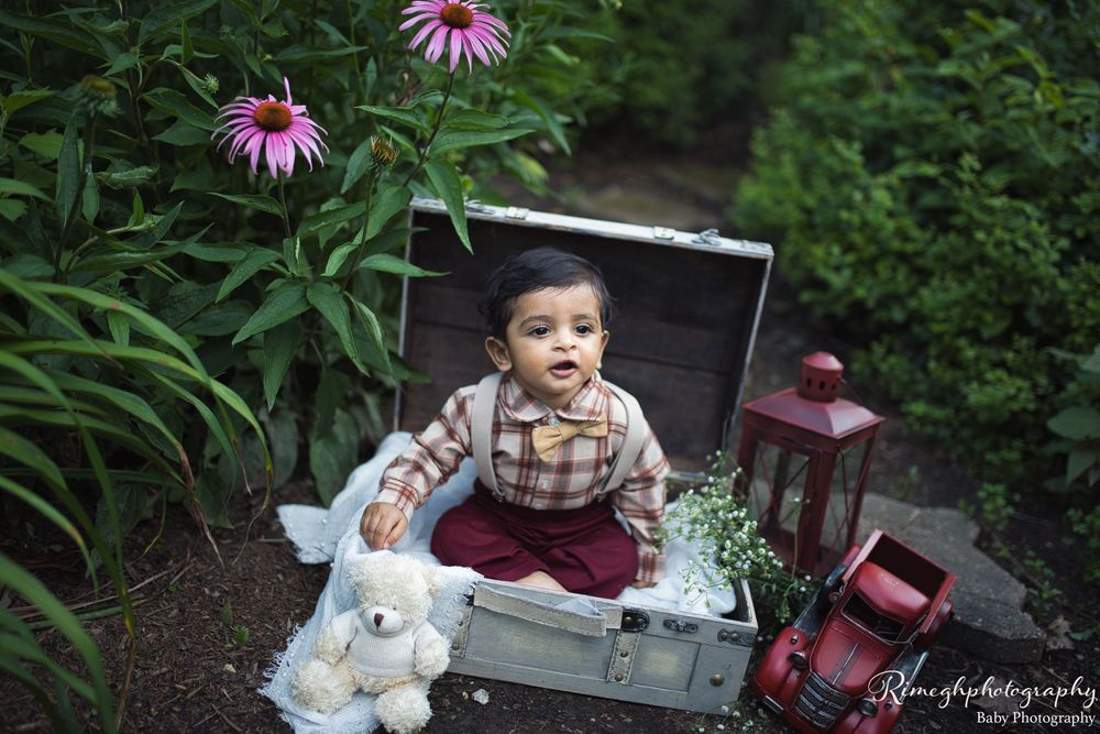 Bhaire Photography cake smash session in Frisco + Dallas TX, bright pastel setup capturing joyful baby moments.