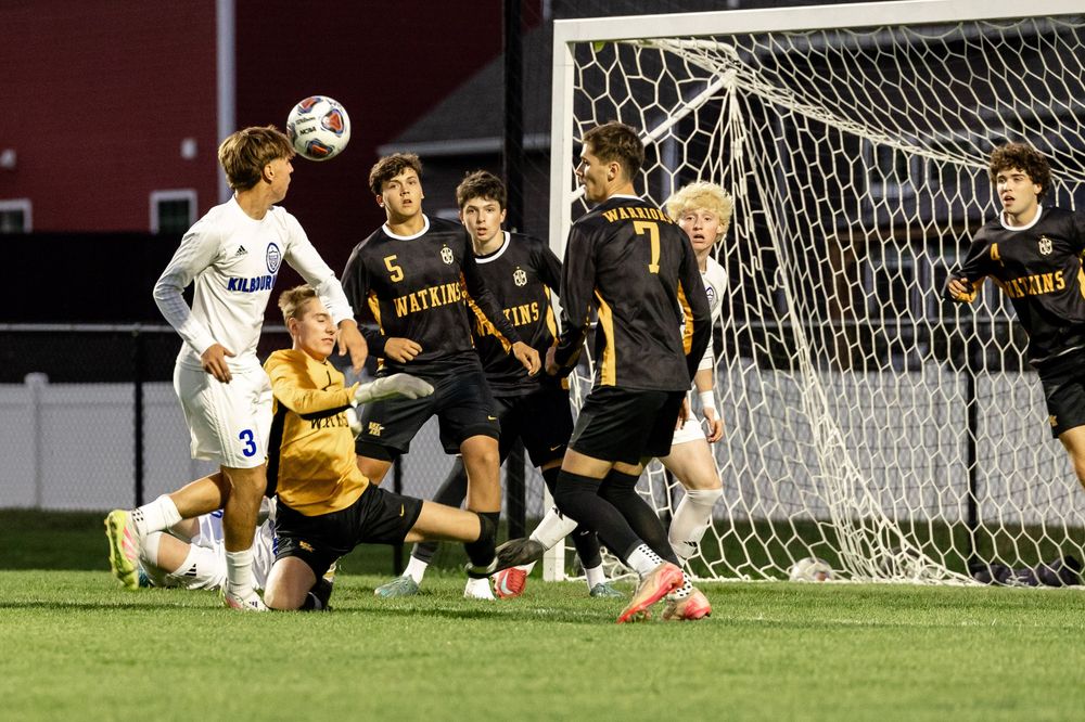 A sequence of soccer match action shots showing players attempting to score goals near the goal net.