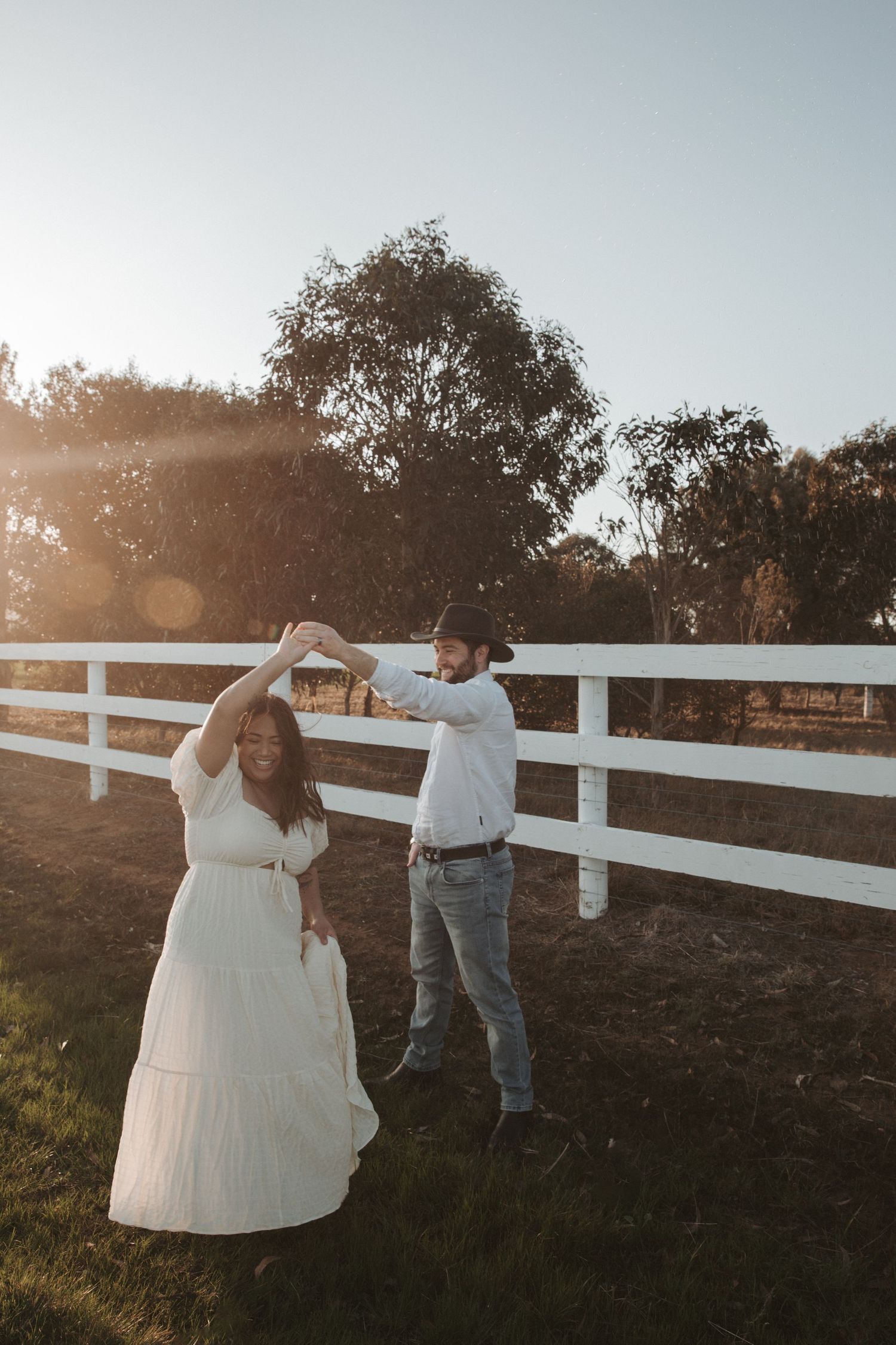 Country couple photoshoot, western couples photography, rustic romance, cowboy and cowgirl, countryside love story, golden hour portraits