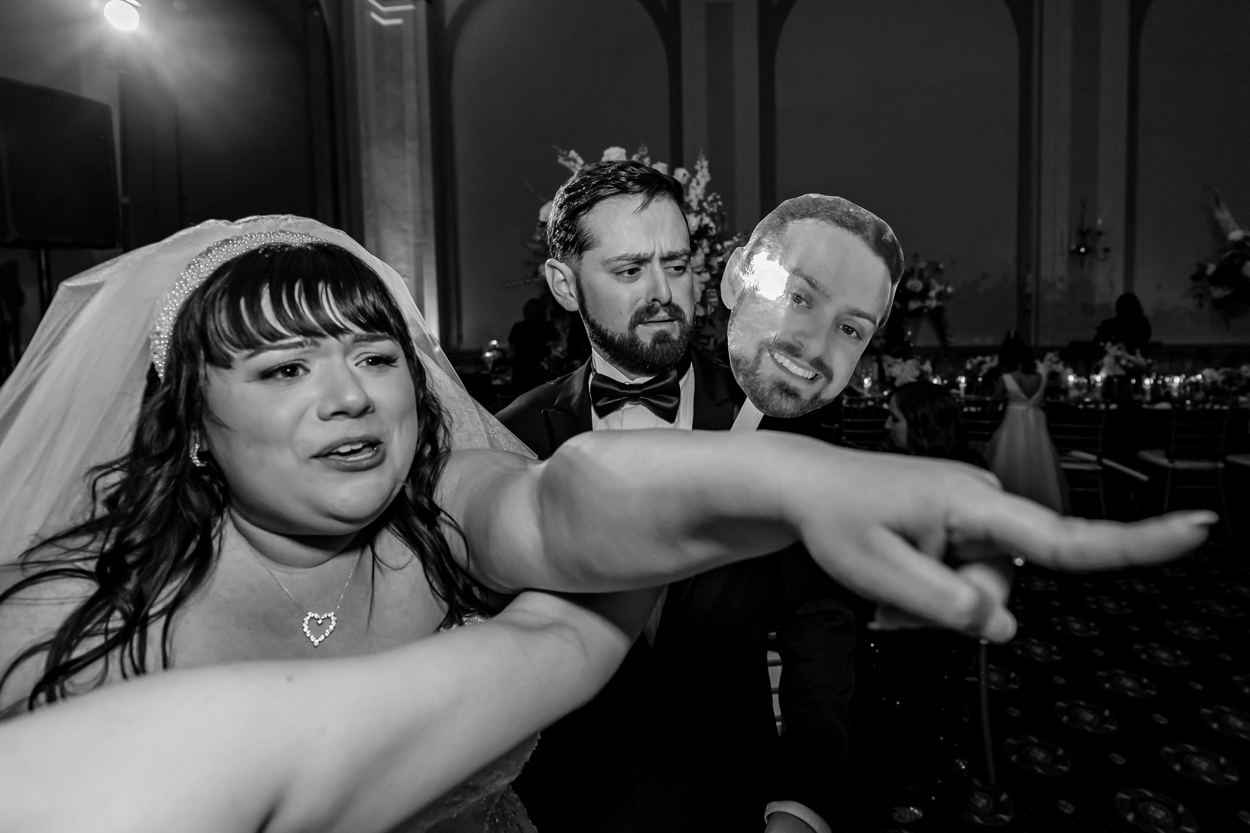 Black and white candid shots capture emotional moments during a wedding celebration.