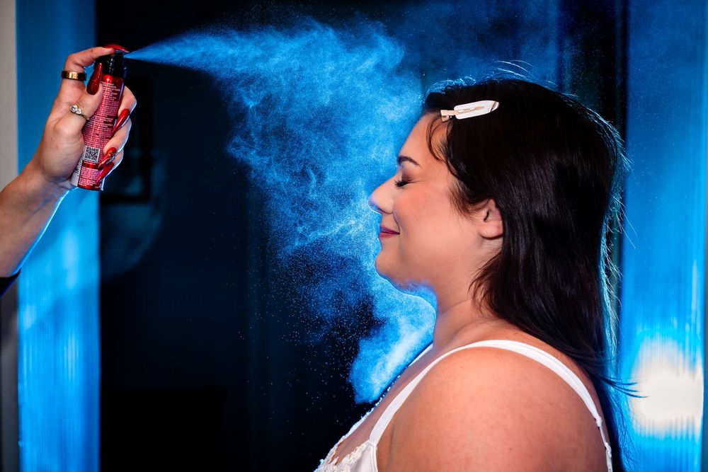 Dramatic blue smoke effect creates atmospheric wedding photography backdrop.