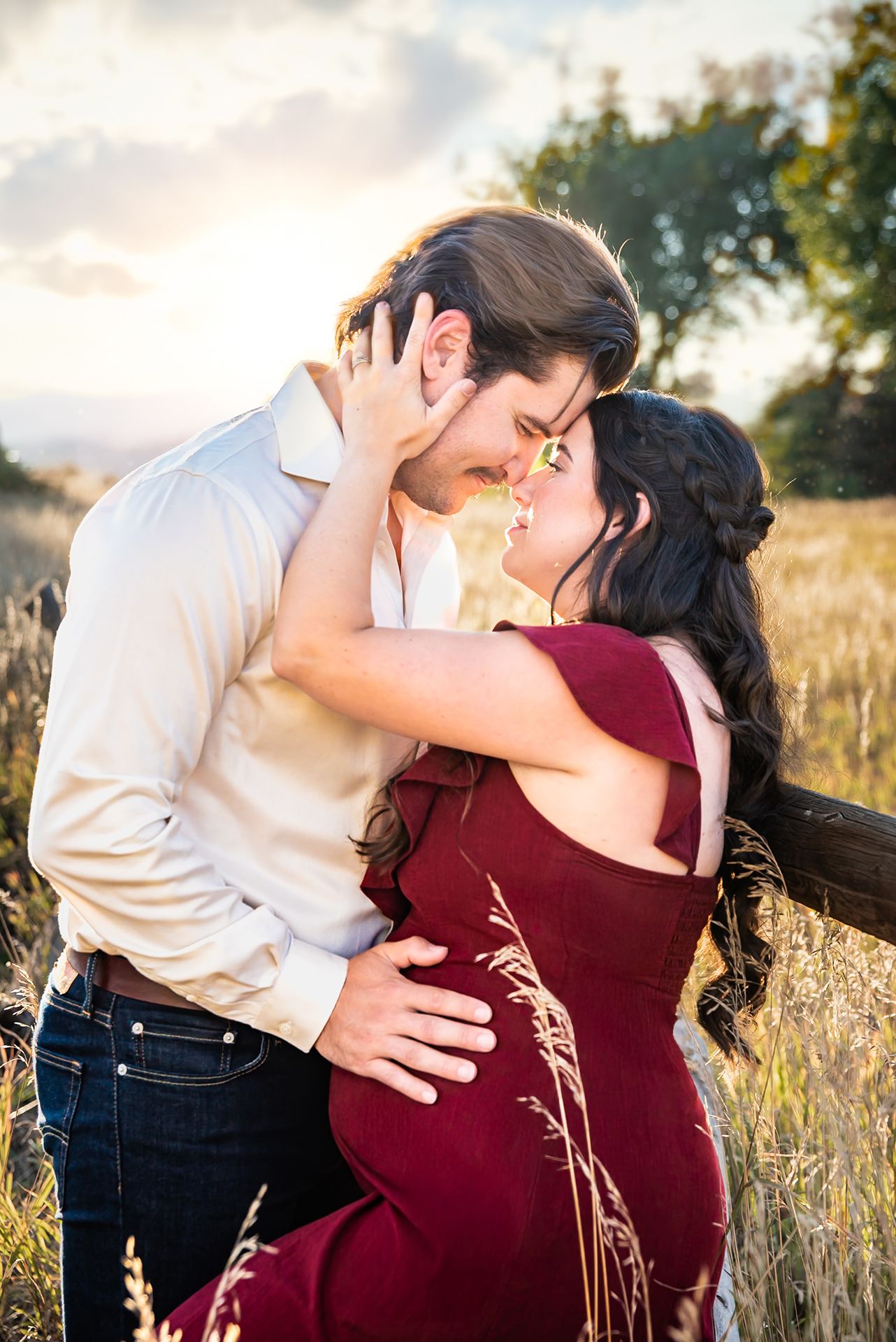 Denver maternity photography of a family session at sunset at Van Bibber Park in Arvada, Colorado.