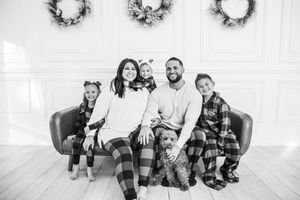 A collection of six holiday family photos with matching plaid outfits and Christmas wreaths in a white studio setting.