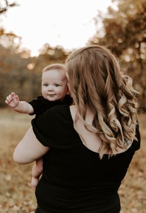 A series of candid family moments captured in warm sepia tones during an autumn photoshoot outdoors.