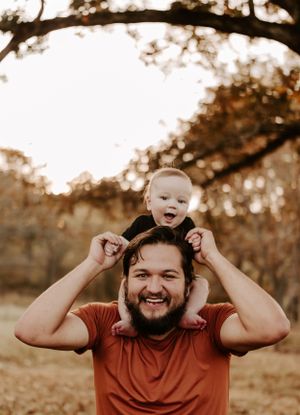 Playful sequence showing joyful interactions between parent and child in an autumn setting.