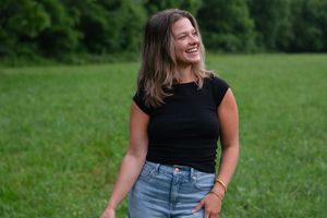 Series of candid poses showing a woman in black top and jeans outdoors.