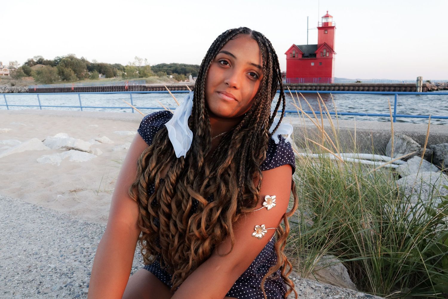 West Michigan Photographer: photo of a mother accompanying her daughter in a lake