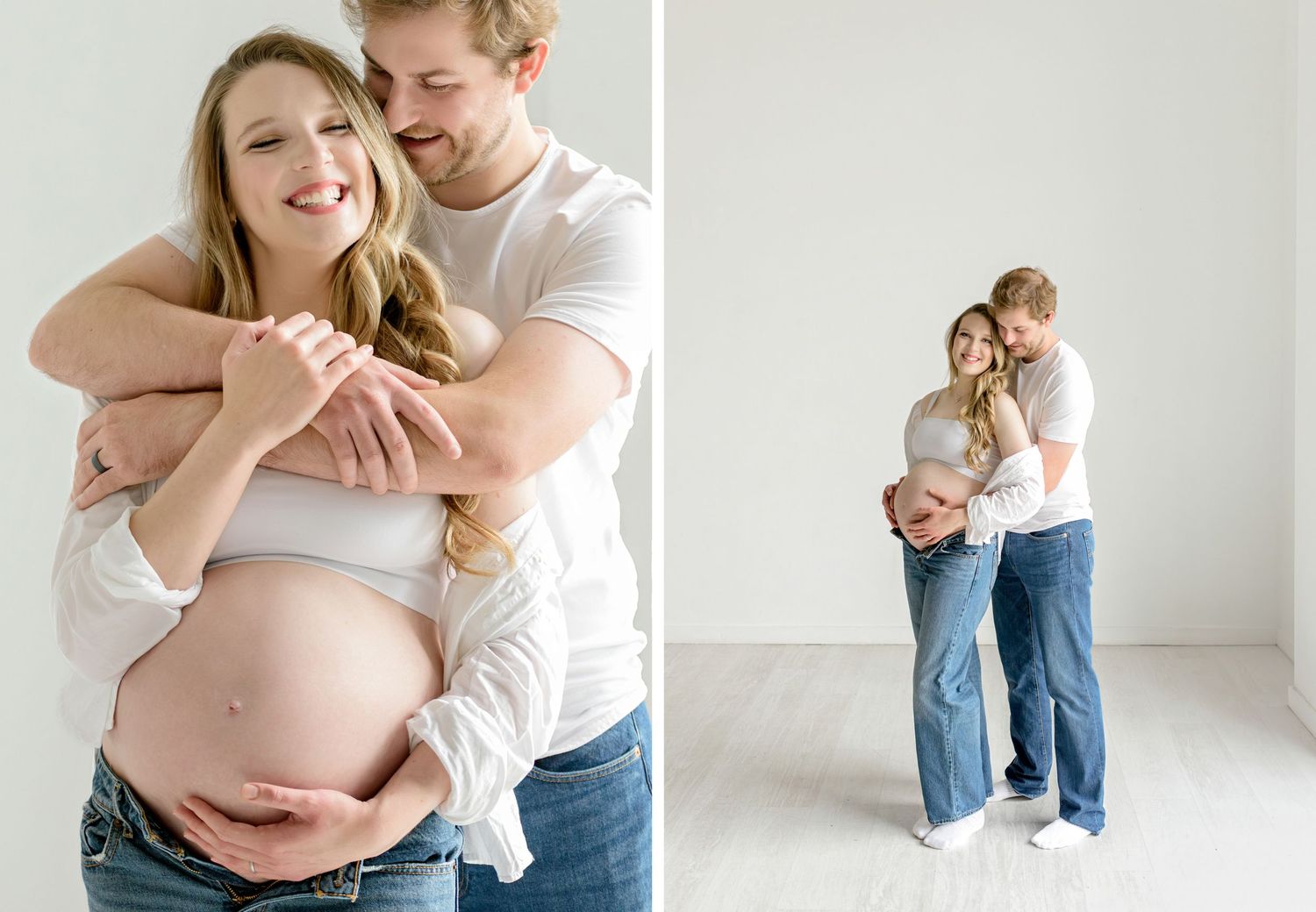 Intimate maternity photography session showing expecting parents embracing in a bright minimalist studio setting.