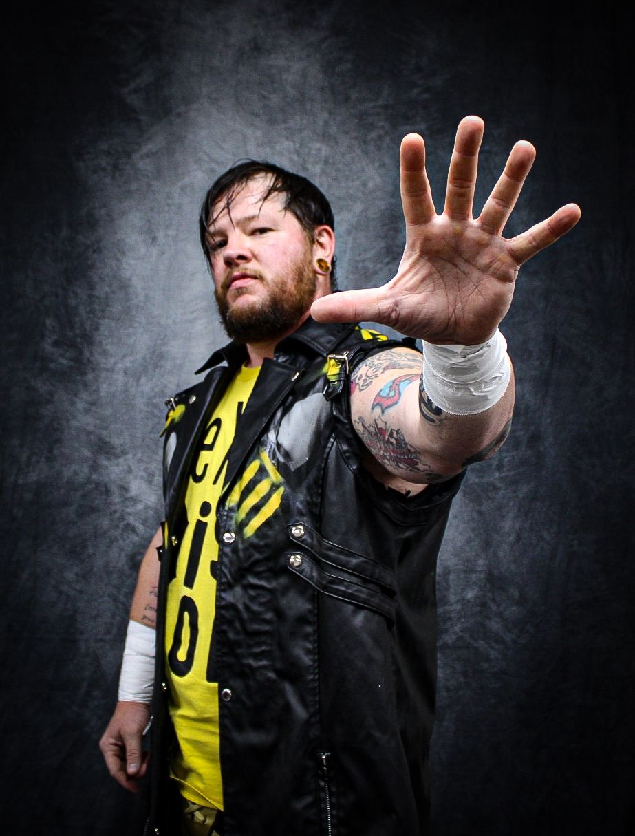 Five dramatic portraits against dark background show dramatic gestures and poses with yellow and black clothing elements.