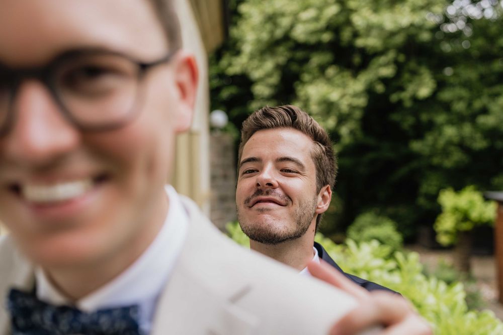 Close-up shot of joyful expressions during a wedding celebration.