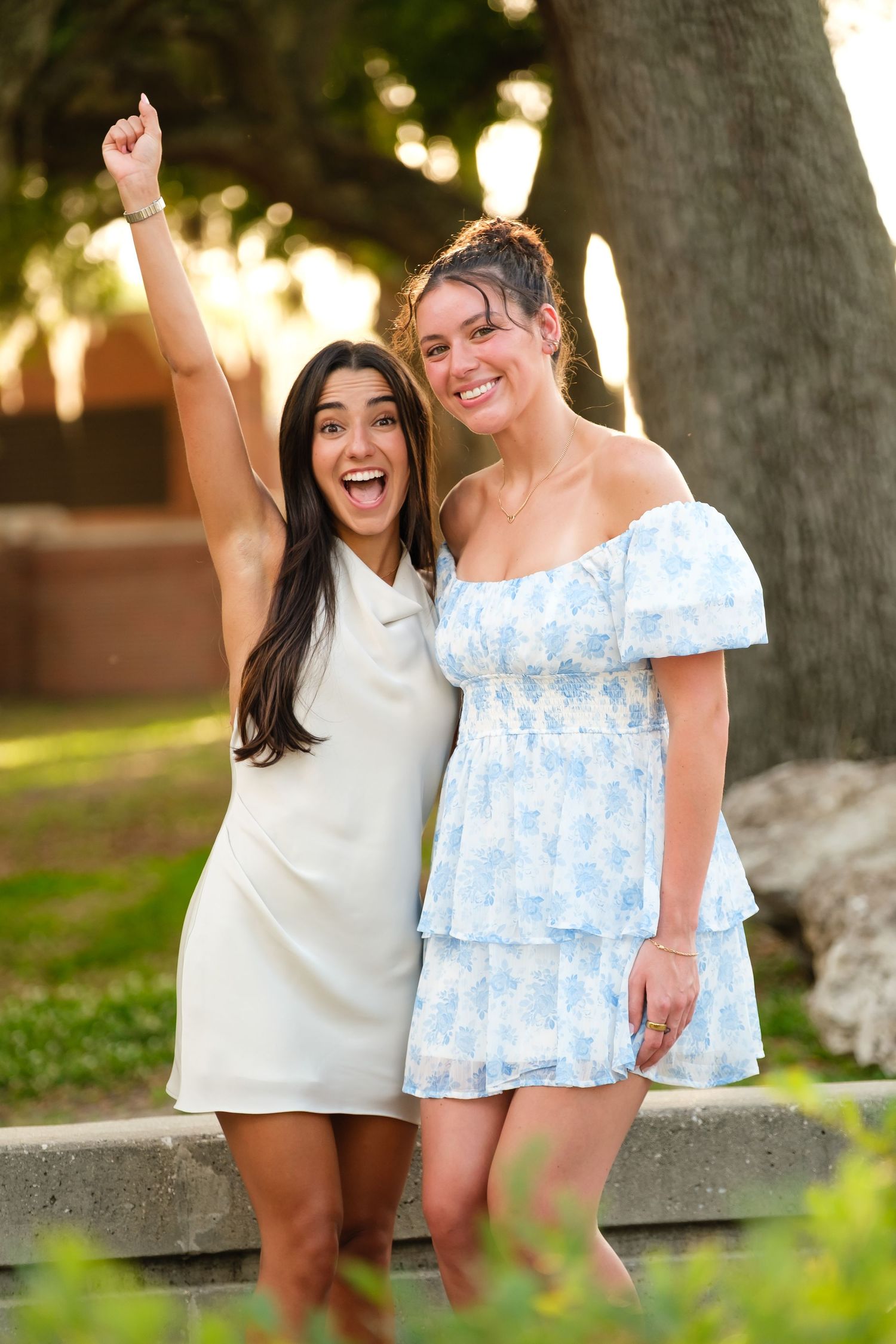Two UF grads celebrate at the University of Florida.
