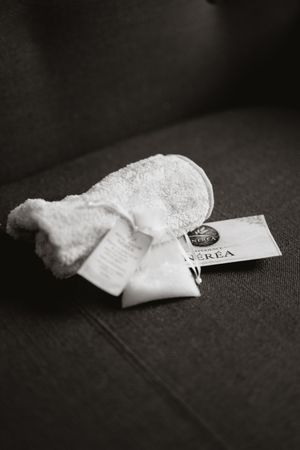 A series of black and white photographs showing a fortune cookie being opened to reveal a small paper fortune inside.
