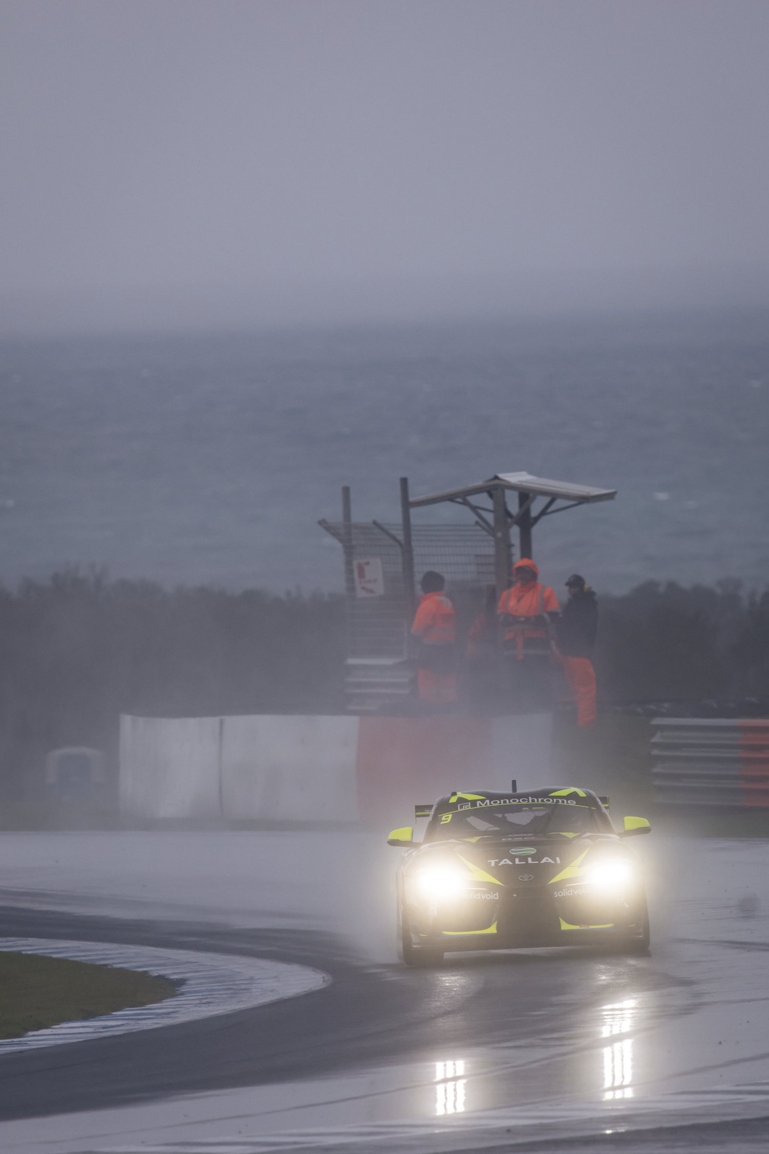 Daniel Frougas with the lights on putting his car on pole for the next race