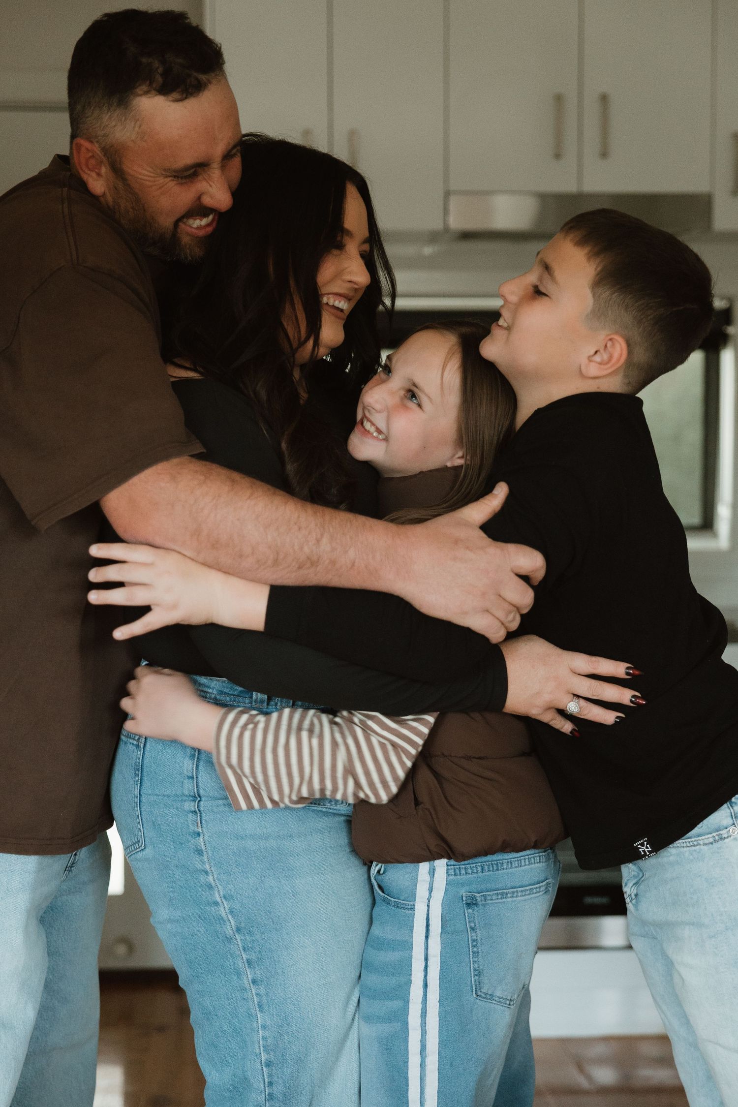 Natural family photography session capturing connection indoor studio Wagga Wagga