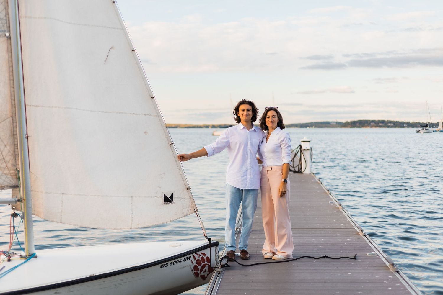 mom and son high school senior pictures parent and child sailing water lake mendota madison wisconsin advice for professional photos tips