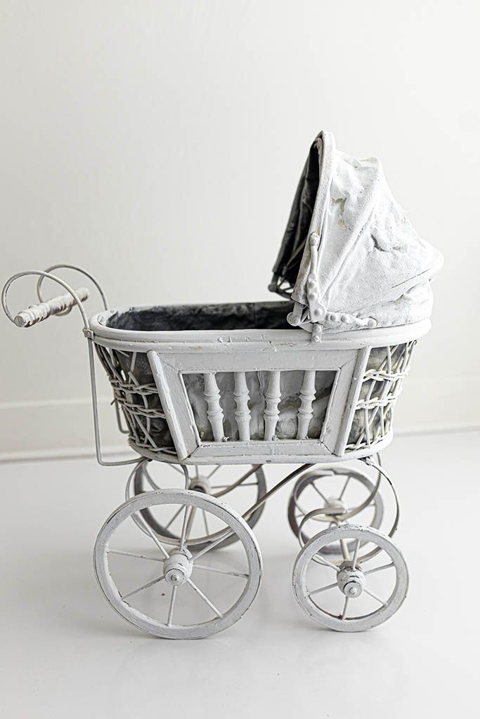 Vintage white wicker baby pram prop for newborn and baby photo session in Menifee.