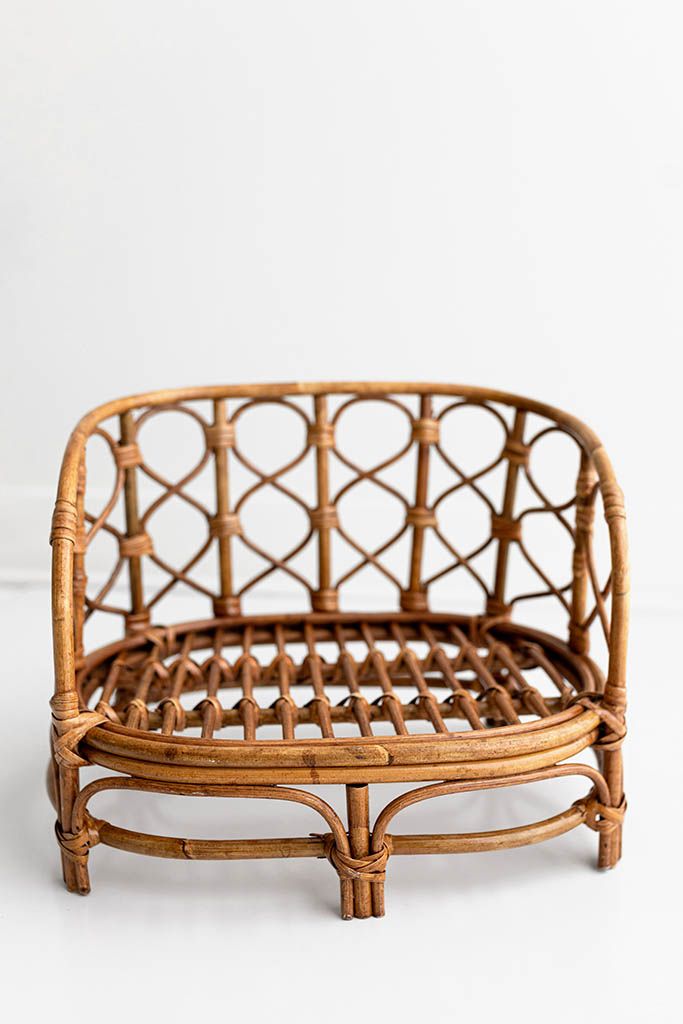 Vintage rattan wicker armchair for baby photoshoot in Menifee, CA.