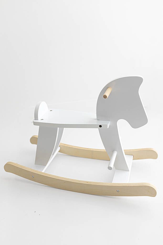 Modern white and natural wood children's rocking horse toy on white background, Temecula baby and child photographer.