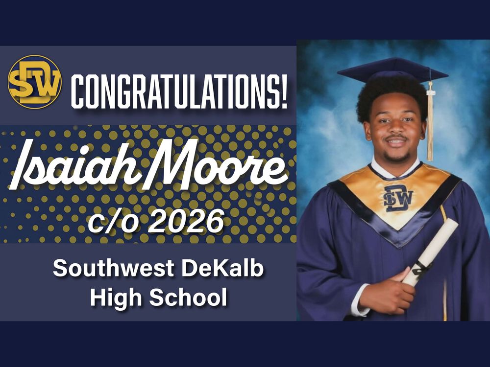 Congratulations banner for Isaiah Moore, c/o 2026 graduate of Southwest DeKalb High School, posing in cap and gown.