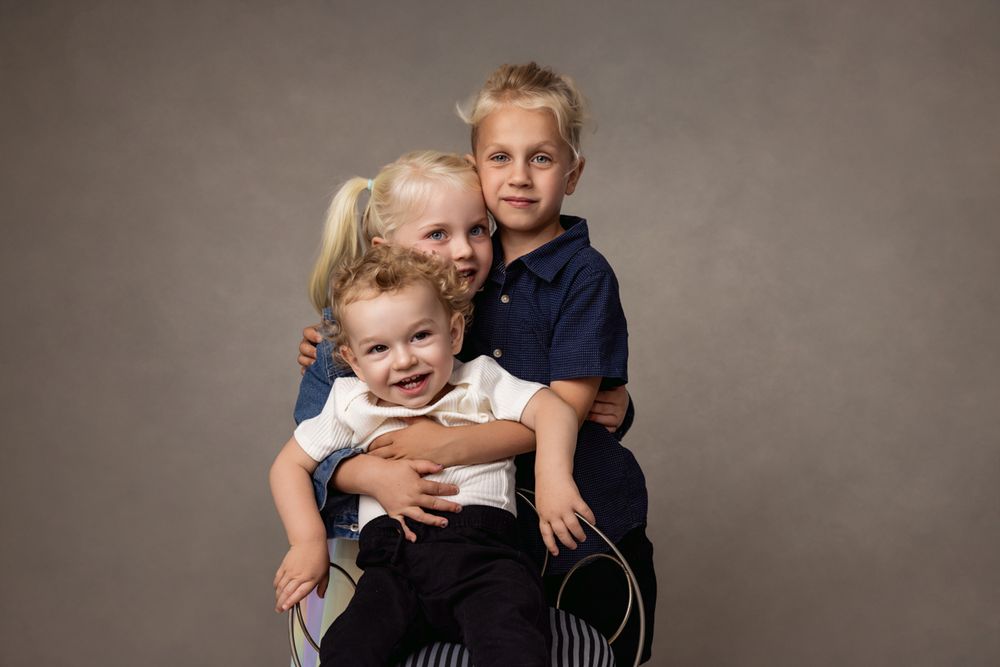Classic family portrait celebrating togetherness and connection,
Sibling love