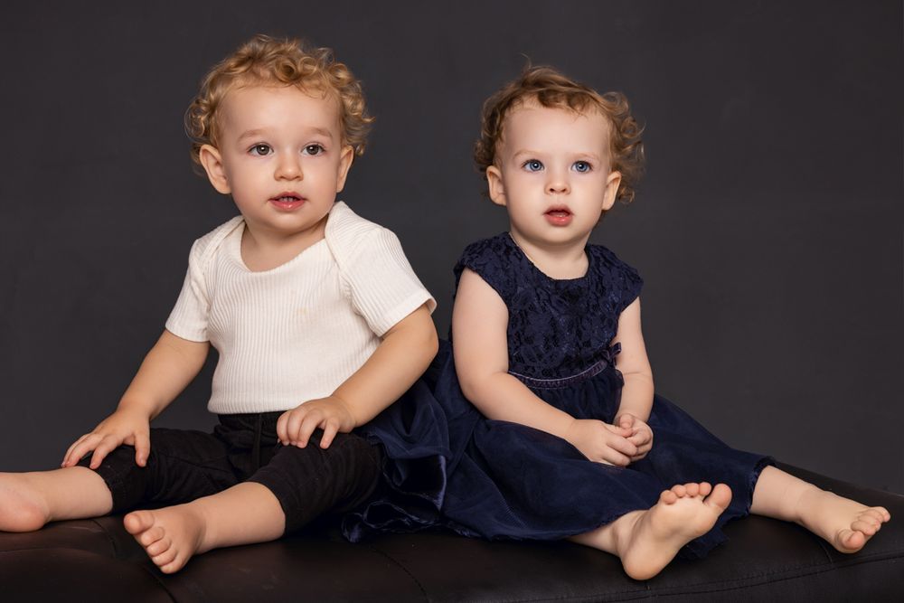 Beautiful family photography capturing treasured memories for generations, two babies who love each other