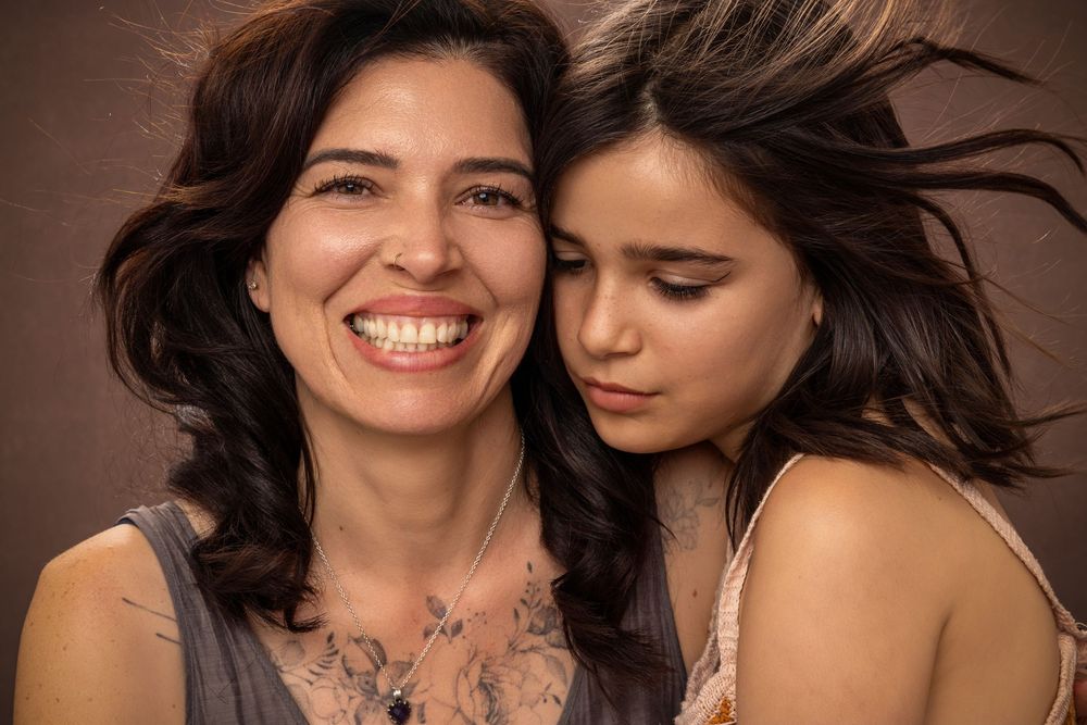 Timeless mother and daughter portrait captured at Tammy Lee Photography studio.