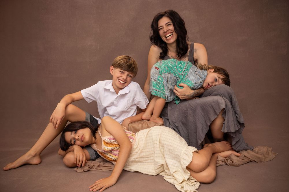 Auckland family photography session celebrating connection and love. Laughing together