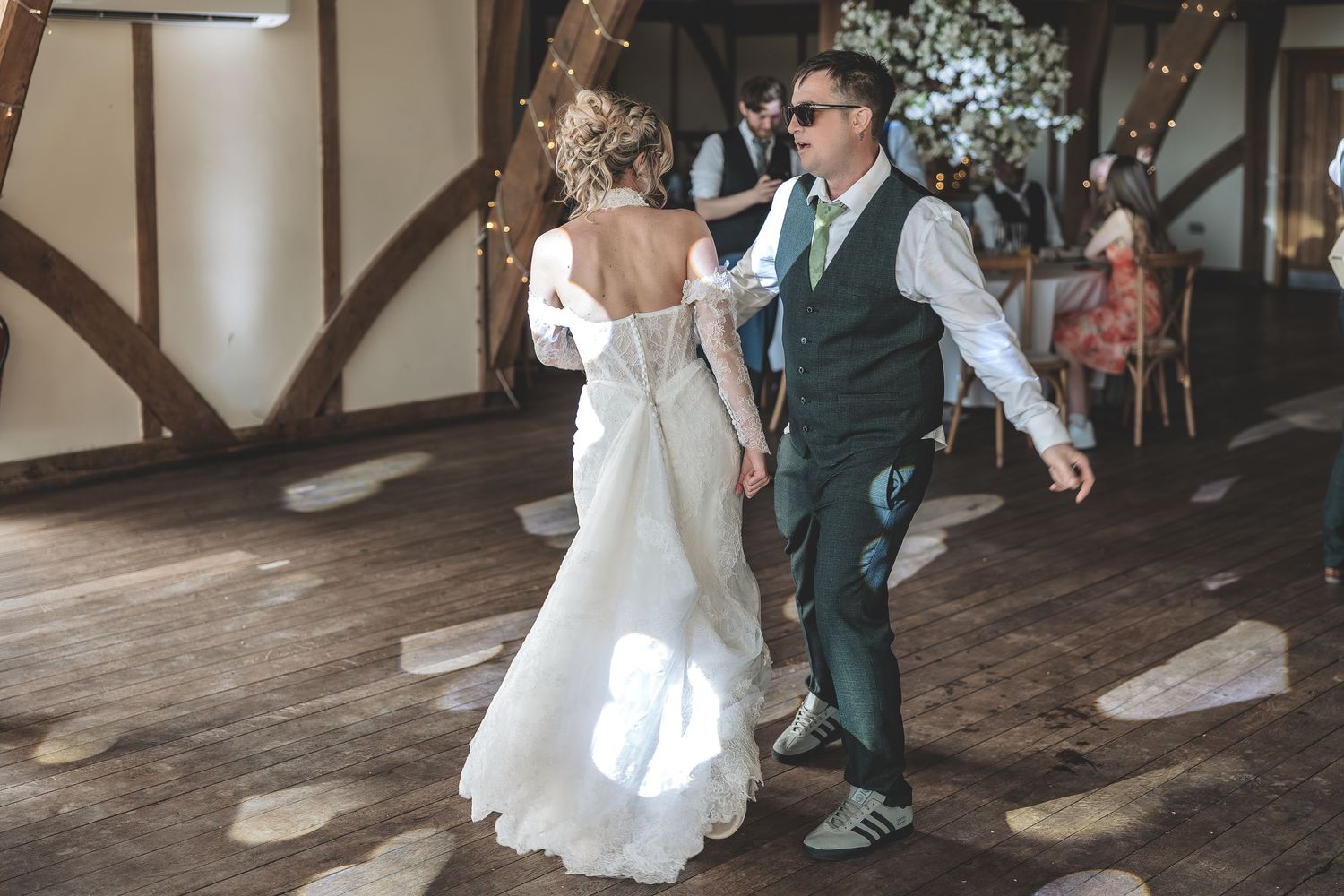 Wedding dance floor candid moment.